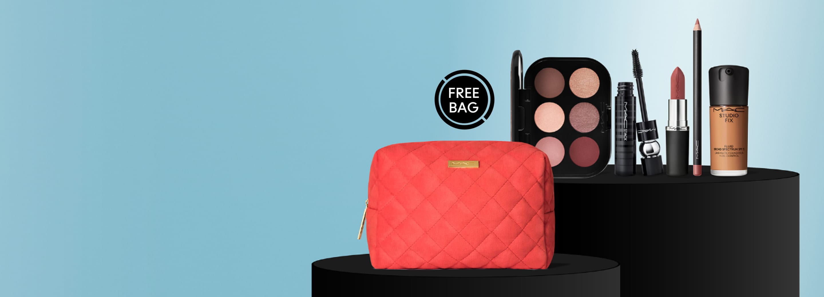 red makeup bag with bestsellers behind