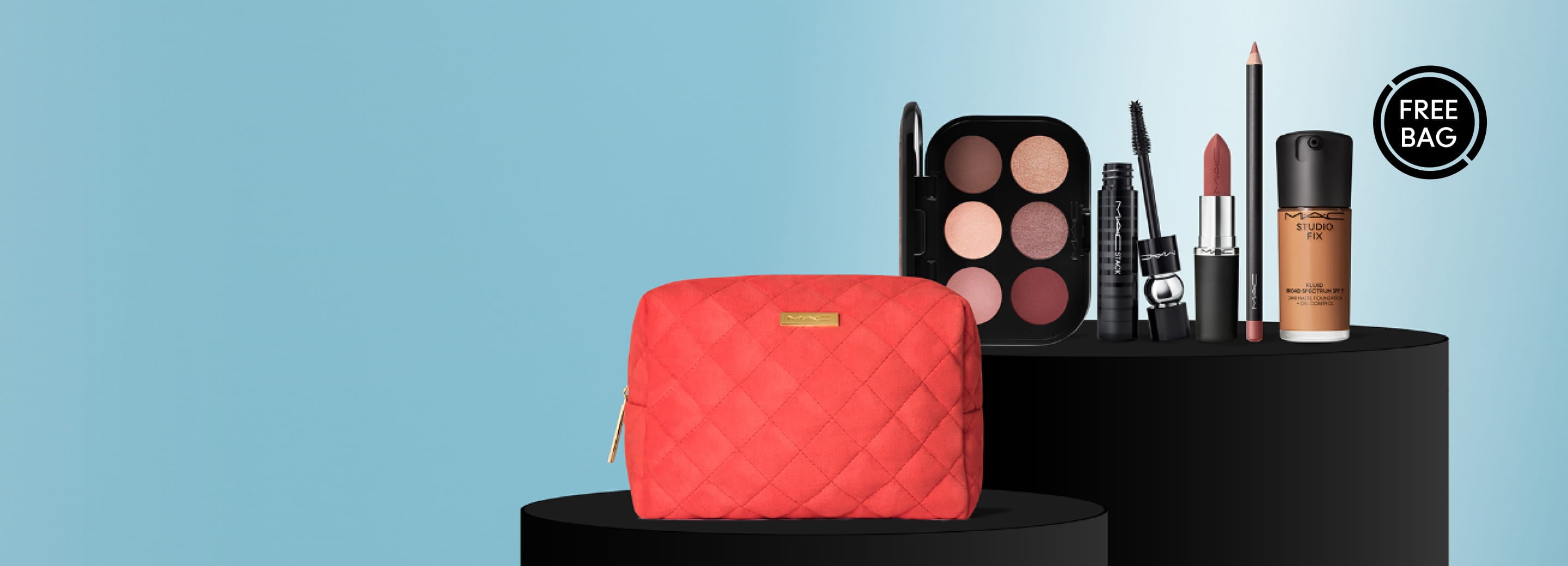 red makeup bag with bestsellers behind