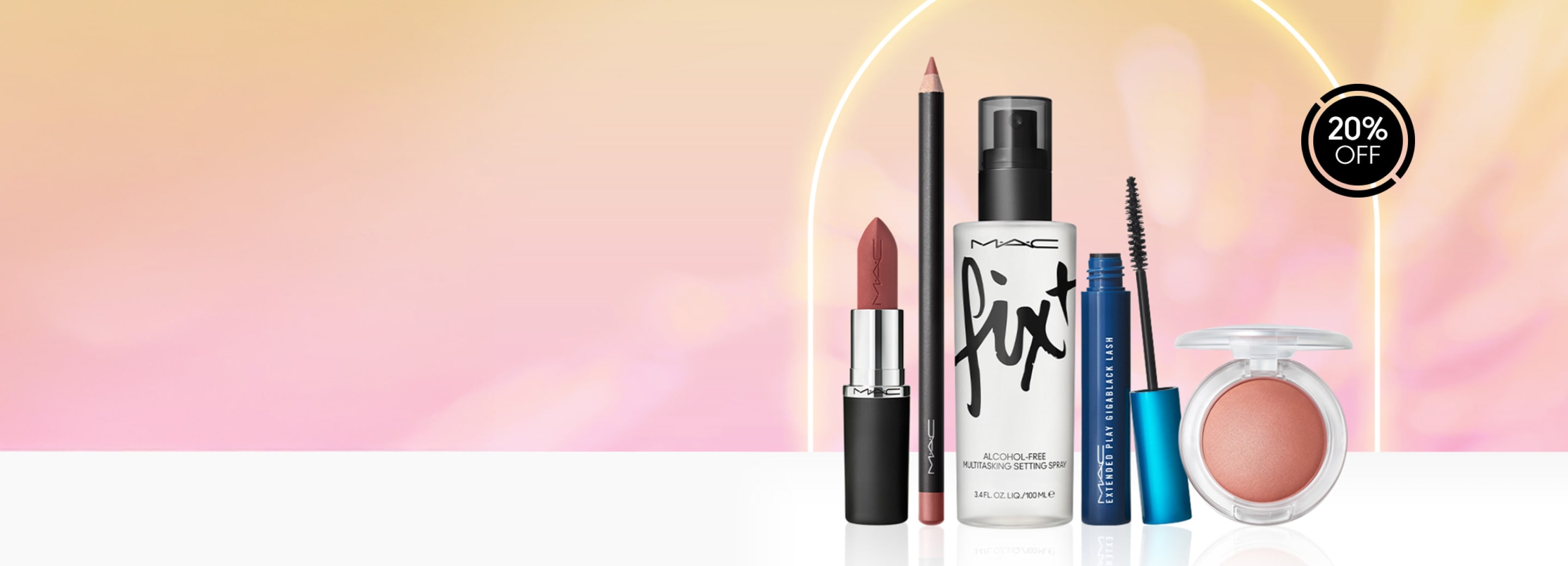 Mac products on a pink and orange background