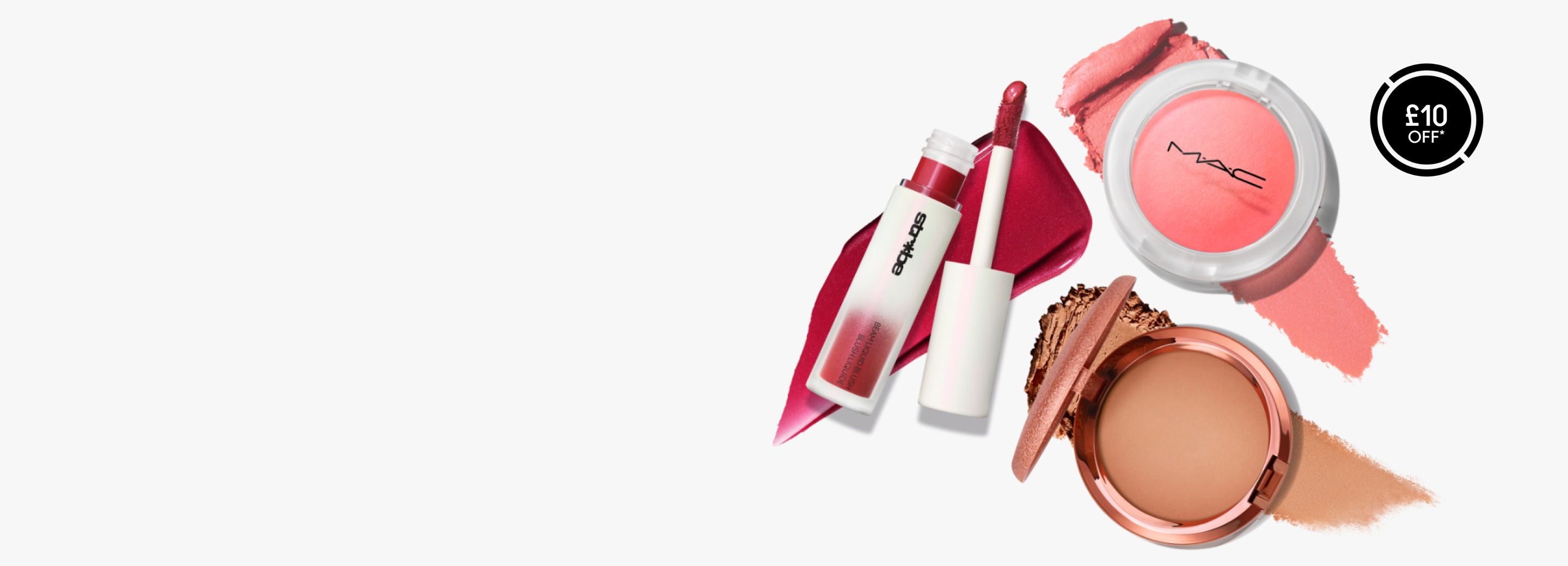 Mac products on a pink and orange background
