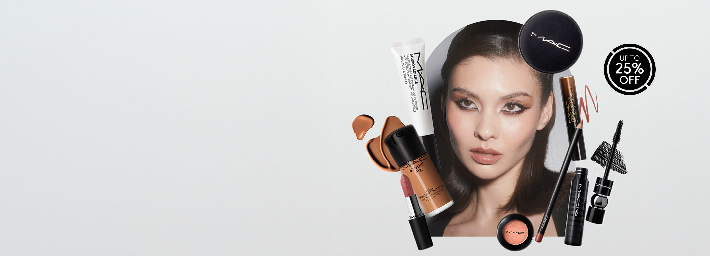 Model and makeup products on grey background