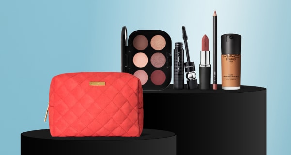 red makeup bag with bestsellers behind