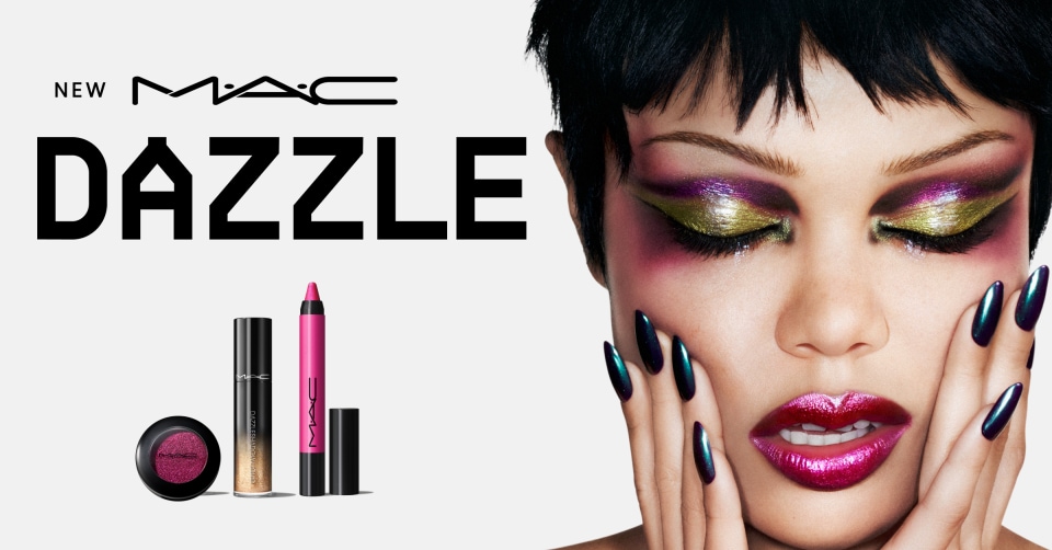 Woman with bold eyeshadow and lipstick with eye products and lip products next