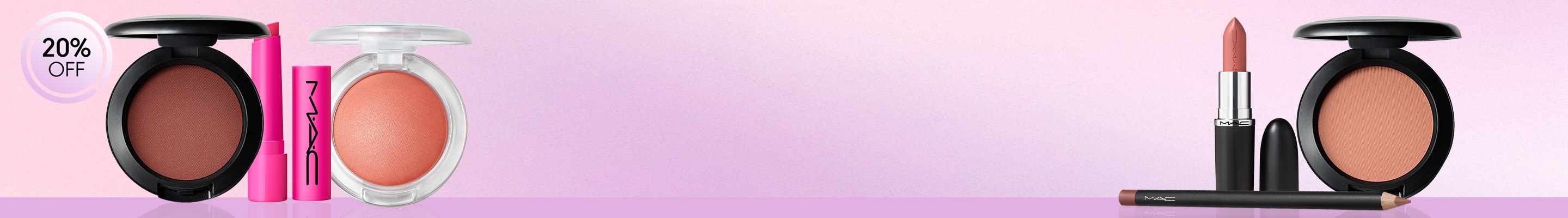 Pink background with lip and blush products
