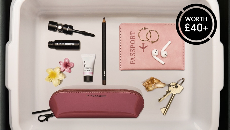 free gifts; eye pencil, mini mactsack, strobe and makeup bag in airport tray