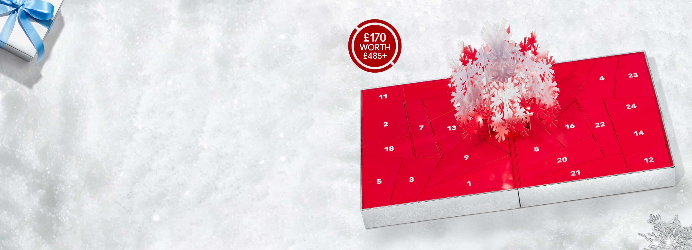 Advent calendar on snowy background