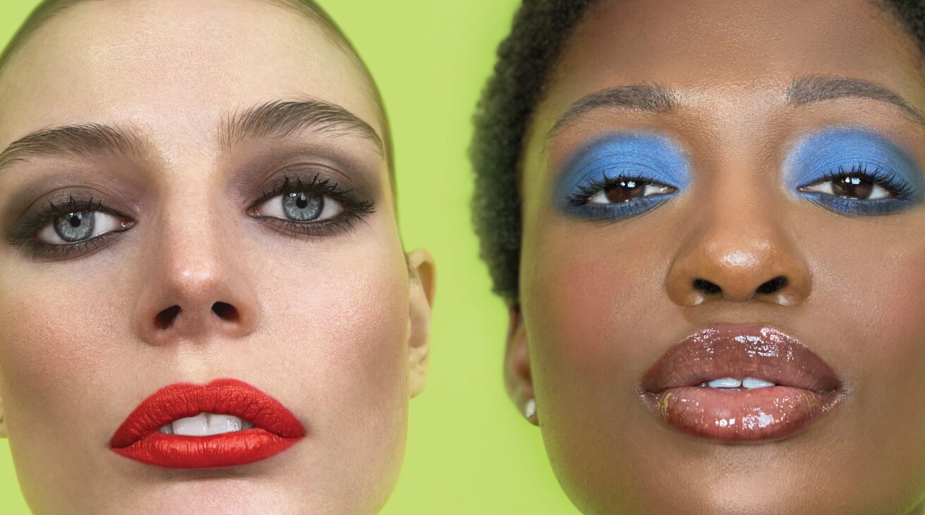 Closeup of 2 models showcasing eye-catching makeup, applied with MAC products