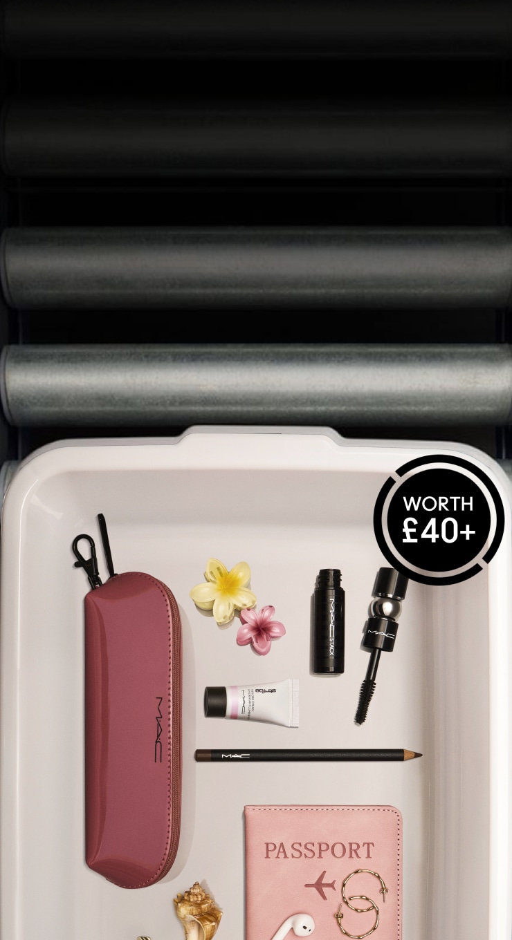 free gifts; eye pencil, mini mactsack, strobe and makeup bag in airport tray